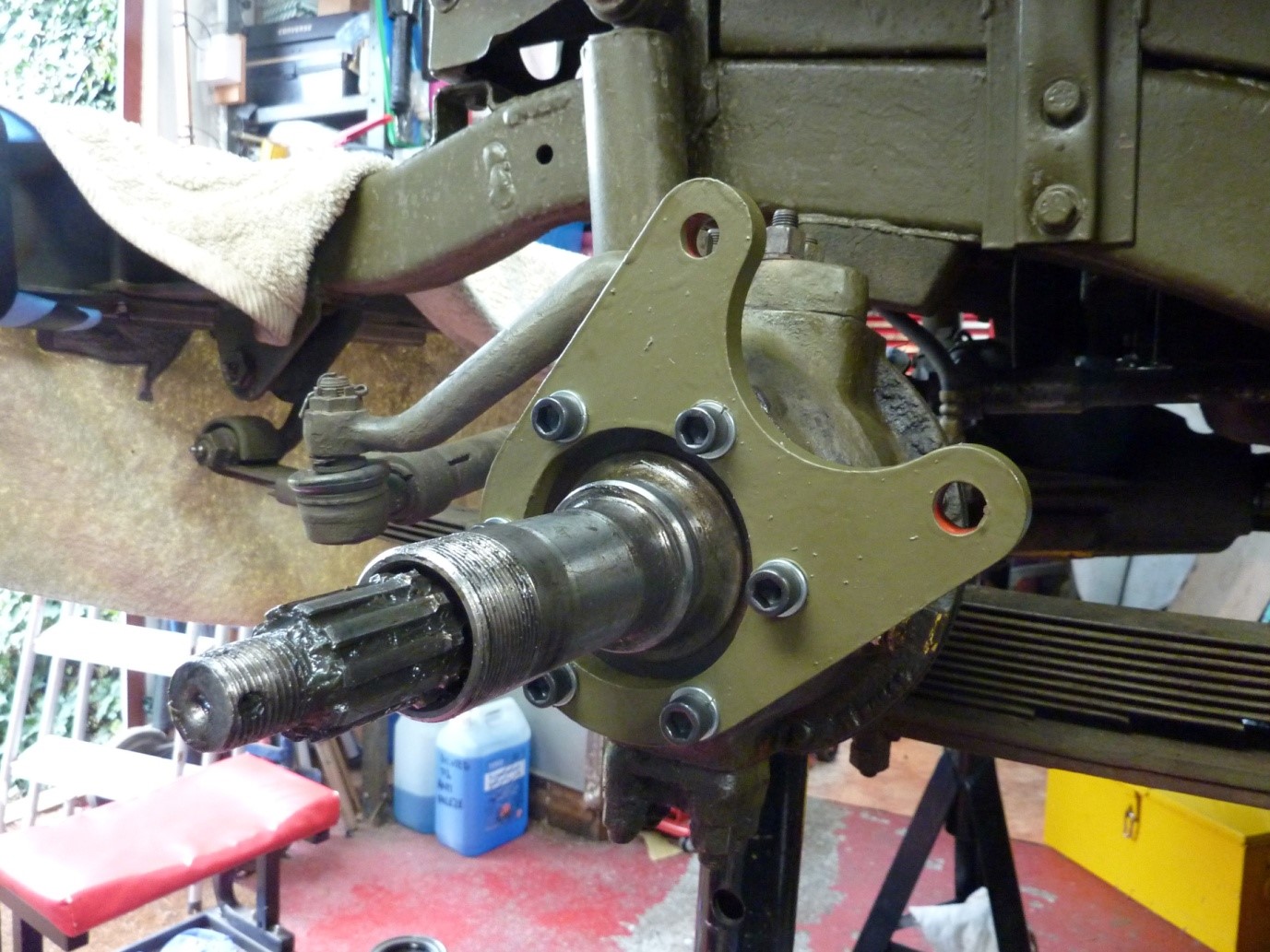03 Bracket Fitting Bracket fitted at about one thirty position. This way the calliper doesn't obstruct access to the knuckle grease plug